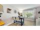 Bright dining area with natural light, a wooden table, white chairs and views of outside at 2042 Australia W Way # 12, Clearwater, FL 33763