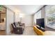 Comfortable living area with recliner sofa and natural light at 2042 Australia W Way # 12, Clearwater, FL 33763