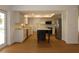 Bright kitchen with white cabinets, stainless steel appliances, and center island at 2105 Curry Rd, Lutz, FL 33549