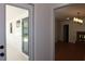 Bright living room with fireplace and views to enclosed porch and the outside at 2105 Curry Rd, Lutz, FL 33549