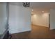 Bright, freshly painted interior with modern hardwood floors and recessed lighting throughout at 2105 Curry Rd, Lutz, FL 33549