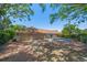 Spacious brick driveway leading to a two-car garage, perfect for multiple vehicles and easy access at 307 Oleander Rd, Belleair, FL 33756
