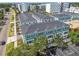 Aerial view of townhomes with gray roofs and parking in a walkable community near retail and restaurants at 3113 4Th N Ter, St Petersburg, FL 33713