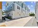Street view highlighting attached garages of the townhomes in the community at 3113 4Th N Ter, St Petersburg, FL 33713