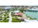 Waterfront homes are surrounded by picturesque canals and lush landscaping in a coastal community at 320 Bath Club Blvd S, North Redington Beach, FL 33708