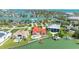 Stunning waterfront homes with pools and docks, nestled in a lush, tropical landscape at 320 Bath Club Blvd S, North Redington Beach, FL 33708