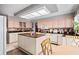 Spacious kitchen with ample counter space and updated appliances at 320 Bath Club Blvd S, North Redington Beach, FL 33708