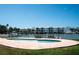 Community pool on the water with beautiful views at 320 Bath Club Blvd S, North Redington Beach, FL 33708