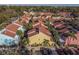 Aerial view of colorful residential homes with well maintained landscaping and a full parking lot at 3540 42Nd S St # F, St Petersburg, FL 33711