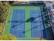 Overhead view of well-maintained tennis courts, perfect for an active lifestyle in the community at 3540 42Nd S St # F, St Petersburg, FL 33711
