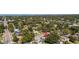 Aerial view of neighborhood homes and nearby bay at 3614 S Lois Ave, Tampa, FL 33629