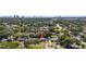 Overhead view of a quiet, residential neighborhood with lush tree coverage at 3614 S Lois Ave, Tampa, FL 33629