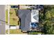 Aerial view of the property showcasing the roof, backyard, and surrounding neighborhood at 3614 S Lois Ave, Tampa, FL 33629