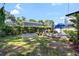 Well-maintained backyard with a garden, shed and patio area at 3614 S Lois Ave, Tampa, FL 33629