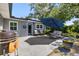 Relaxing patio area with grill, seating, and potted plants at 3614 S Lois Ave, Tampa, FL 33629