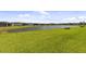 Backyard view of the lake behind the home at 5858 Shorebird Br, Land O Lakes, FL 34638