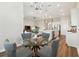 Cozy dining area adjacent to kitchen and living room, perfect for casual meals and entertaining at 5858 Shorebird Br, Land O Lakes, FL 34638