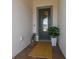 Inviting entryway with stylish decor, neutral paint and attractive tile flooring at 5858 Shorebird Br, Land O Lakes, FL 34638