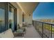 Spacious balcony with comfortable seating and stunning water views, perfect for relaxing and entertaining at 6 Belleview Blvd # 505, Belleair, FL 33756