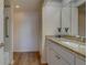 Bathroom featuring granite countertops, vanity with sink, shower, and accessibility bar at 6 Belleview Blvd # 505, Belleair, FL 33756