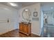 Charming condo hallway with wooden floors and decorative wall art at 6 Belleview Blvd # 505, Belleair, FL 33756