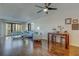 Bright living room featuring modern furniture, hardwood floors, and balcony access at 6 Belleview Blvd # 505, Belleair, FL 33756
