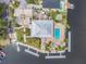 Waterfront property with a swimming pool, dock, and multiple boat slips, perfect for the avid boater at 6241 Bayside Dr, New Port Richey, FL 34652