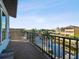 Balcony view overlooking the water with tropical landscaping and nearby homes at 6241 Bayside Dr, New Port Richey, FL 34652