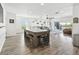 Spacious living room featuring wood-style floors and ample natural light at 6241 Bayside Dr, New Port Richey, FL 34652