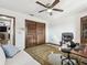 Spacious office features hardwood floors, neutral walls, and a closet for storage at 6241 Bayside Dr, New Port Richey, FL 34652
