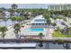 Waterfront home with a beautiful in-ground pool, lush landscaping, and private dock with direct access to the open water at 6241 Bayside Dr, New Port Richey, FL 34652