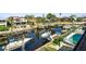 Waterfront homes feature backyard docks, lifts, and boats along a beautiful canal at 6241 Bayside Dr, New Port Richey, FL 34652