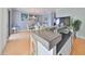 Enjoy meals in this light filled dining area adjacent to the kitchen with lovely artwork at 6407 Mayra Shores Ln, Apollo Beach, FL 33572