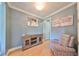 Cozy office space with hardwood floors, soft colors, lovely decor, and plenty of natural light at 6407 Mayra Shores Ln, Apollo Beach, FL 33572