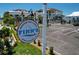 Close-up of Finn's Dockside Bar & Grill sign in Apollo Beach, FL, surrounded by landscaping and a parking lot at 6407 Mayra Shores Ln, Apollo Beach, FL 33572