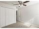 Spacious bedroom with a ceiling fan and closet at 7350 Lumber Port Dr, Ruskin, FL 33573