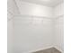 Walk-in closet offering ample storage with wire shelving at 7350 Lumber Port Dr, Ruskin, FL 33573