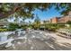 Outdoor picnic area with barbecue grills, picnic tables, and seating, perfect for community gatherings at 7700 Sun Island S Dr # 404, South Pasadena, FL 33707
