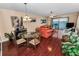 Open dining and living area with views of the water, ideal for meals and entertainment at 7700 Sun Island S Dr # 404, South Pasadena, FL 33707