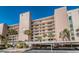 The Condo 777 is a beautifully landscaped building with covered parking and multiple balconies at 7700 Sun Island S Dr # 404, South Pasadena, FL 33707