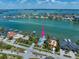 Desirable waterfront property with mature landscaping and dock access, conveniently located near city amenities and recreational waters at 785 Bay Esplanade, Clearwater Beach, FL 33767