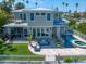 Beautiful home featuring a pool, outdoor patio, and waterfront access, ideal for relaxing and entertaining by the water at 785 Bay Esplanade, Clearwater Beach, FL 33767