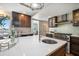Updated kitchen with a large center island, updated cabinets and stainless appliances at 785 Bay Esplanade, Clearwater Beach, FL 33767