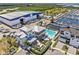 Stunning aerial view of a luxury home with a private pool and marina access, providing an exclusive waterfront lifestyle at 923 Seagrape Dr, Ruskin, FL 33570