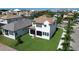 The backyard boasts a screened lanai and a well-maintained lawn, perfect for outdoor relaxation and enjoyment at 923 Seagrape Dr, Ruskin, FL 33570