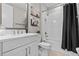 Bathroom featuring white subway tile and a shower and tub combination at 923 Seagrape Dr, Ruskin, FL 33570