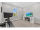 Cozy bedroom with bright window, carpeted floors, providing a serene and comfortable space at 923 Seagrape Dr, Ruskin, FL 33570
