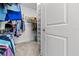 Spacious walk-in closet featuring shelving and plenty of storage space at 923 Seagrape Dr, Ruskin, FL 33570
