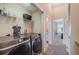 Convenient laundry room with modern Samsung washer and dryer and additional storage space at 9807 Carlsdale Dr, Riverview, FL 33578