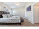 Cozy main bedroom with a TV, neutral decor, and ample natural light at 9807 Carlsdale Dr, Riverview, FL 33578